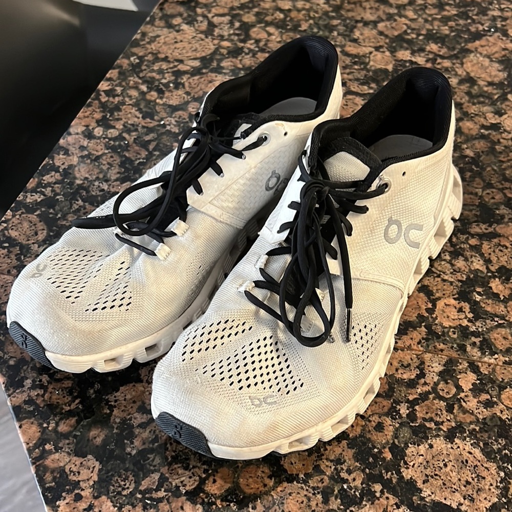 On running shoes size 11 (white)